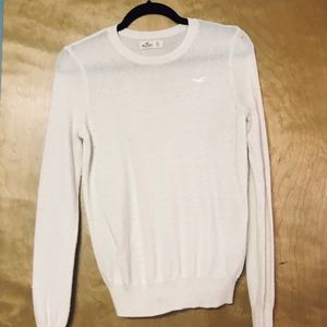 A very light long sleeved white T-shirt